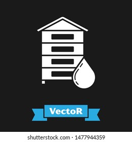 White Hive for bees icon isolated on black background. Beehive symbol. Apiary and beekeeping. Sweet natural food.  Vector Illustration