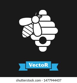 White Hive for bees icon isolated on black background. Beehive symbol. Apiary and beekeeping. Sweet natural food.  Vector Illustration