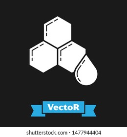 White Honeycomb icon isolated on black background. Honey cells symbol. Sweet natural food.  Vector Illustration