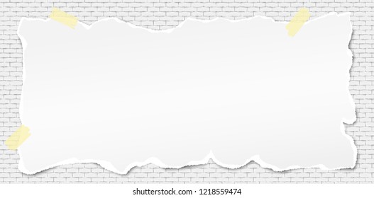 White horizontal ripped paper strip with torn edges, torn note paper for text or message on brick wall background