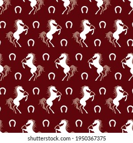 White horse and horseshoe silhouette seamless pattern. Vector illustration.