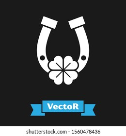 White Horseshoe with four leaf clover icon isolated on black background. Happy Saint Patricks day.  Vector Illustration