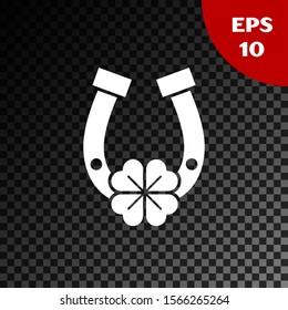 White Horseshoe with four leaf clover icon isolated on transparent dark background. Happy Saint Patricks day.  Vector Illustration