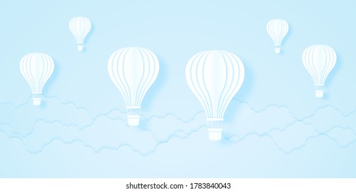 White hot air balloons flying in the blue sky and cloudscape, paper art style