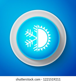 White Hot and cold symbol. Sun and snowflake icon isolated on blue background. Winter and summer symbol. Circle blue button with white line. Vector Illustration
