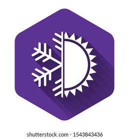 White Hot and cold symbol. Sun and snowflake icon isolated with long shadow. Winter and summer symbol. Purple hexagon button. Vector Illustration