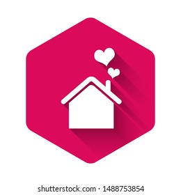 White House with heart shape icon isolated with long shadow. Love home symbol. Family, real estate and realty. Pink hexagon button. Vector Illustration