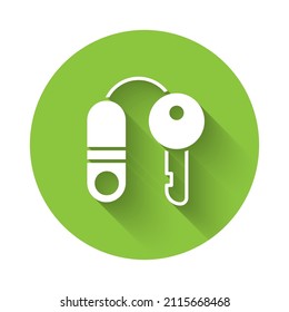 White House with key icon isolated with long shadow. The concept of the house turnkey. Green circle button. Vector Illustration