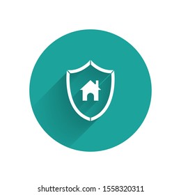 White House with shield icon isolated with long shadow. Insurance concept. Security, safety, protection, protect concept. Green circle button. Vector Illustration