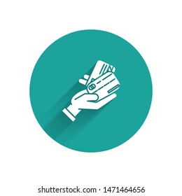White Human hand holding with credit card icon isolated with long shadow. Online payment. Pay by card. Financial operations. Green circle button. Vector Illustration
