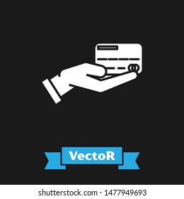White Human hand holding with credit card icon isolated on black background. Online payment. Pay by card. Financial operations.  Vector Illustration