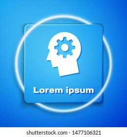 White Human head with gear inside icon isolated on blue background. Artificial intelligence. Thinking brain sign. Symbol work of brain. Blue square button. Vector Illustration