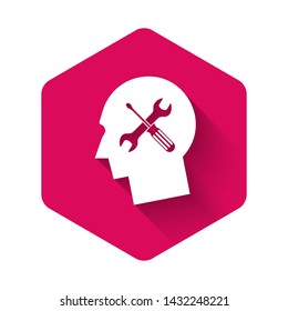 White Human head with with screwdriver and wrench icon isolated with long shadow. Artificial intelligence. Symbol work of brain. Pink hexagon button. Vector Illustration