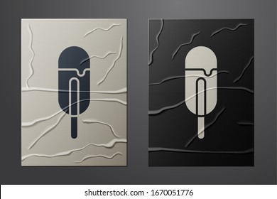 White Ice cream icon isolated on crumpled paper background. Sweet symbol. Paper art style. Vector Illustration