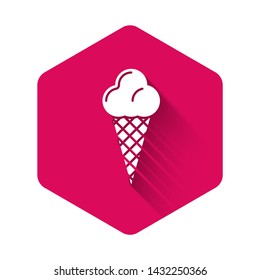 White Ice cream in waffle cone icon isolated with long shadow. Sweet symbol. Pink hexagon button. Vector Illustration