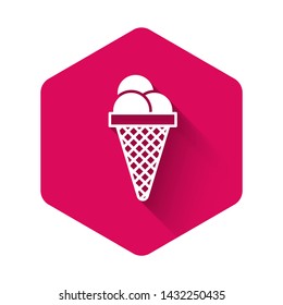 White Ice cream in waffle cone icon isolated with long shadow. Sweet symbol. Pink hexagon button. Vector Illustration