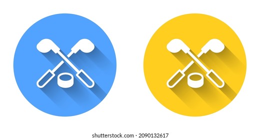 White Ice hockey sticks and puck icon isolated with long shadow background. Game start. Circle button. Vector