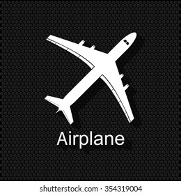 White icon put on a black polka dot background. airplane icon.