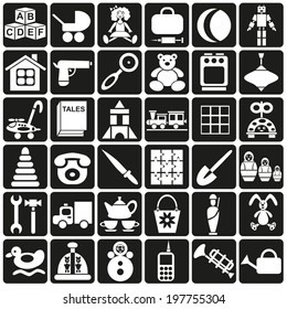 white icons in black rectangles on children's toys.