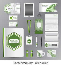 White identity template with green origami elements. Vector company style for brandbook guideline and Pens mugs CDs books business cards letterhead flag Card Portfolio employees Tablet flash drive