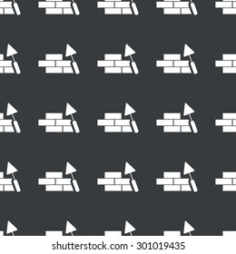 White image of brick wall under construction repeated on black background