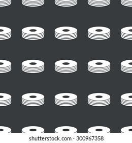 White image of disc pile repeated on black background