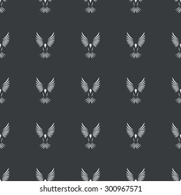 White image of flying bird repeated on black background