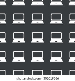 White image of laptop repeated on black background
