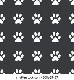 White image of paw print repeated on black background