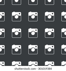 White image of square camera repeated on black background