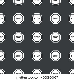 White image of STOP sign repeated on black background