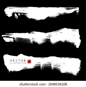 White ink brush stroke on black background. Japanese brush style banner. Vector illustration of grunge stains