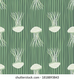 White jellyfish silhouettes seamless pattern. Stylized underwater wildlife print with green stripped background. Designed for wallpaper, textile, wrapping paper, fabric print. Vector illustration.