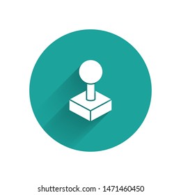 White Joystick for arcade machine icon isolated with long shadow. Joystick gamepad. Green circle button. Vector Illustration