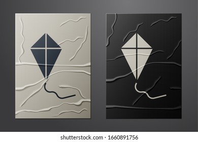 White Kite icon isolated on crumpled paper background. Paper art style. Vector Illustration