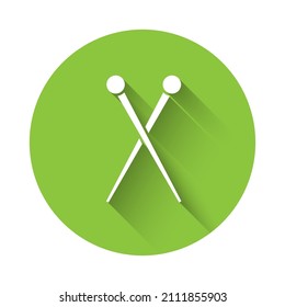 White Knitting needles icon isolated with long shadow. Label for hand made, knitting or tailor shop. Green circle button. Vector Illustration