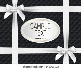 white label and bows on a dark background of the texture