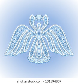 white lace angel with Christmas star in the sky