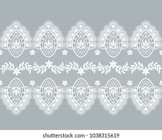white lace border with floral pattern on a gray background
