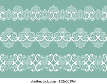 white lace borders with floral pattern on a turquoise background