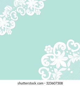 White lace borders on a turquoise background