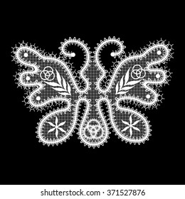 White lace butterfly on black background