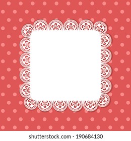 White lace doily border on a red polka dot background