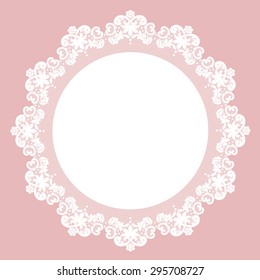 White lace doily with flowery pattern on a pink background