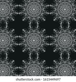 white lace mandala  pattern on a black background