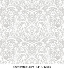 White lace seamless pattern with flowers on beige background