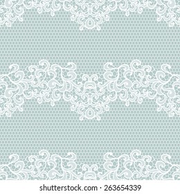 White lace seamless pattern with flowers on blue background