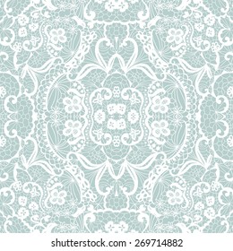 White lace seamless pattern with flowers on blue background