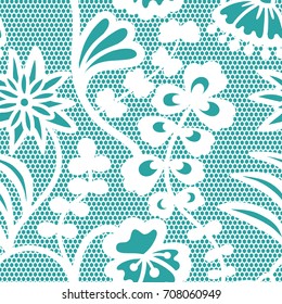 White lace seamless pattern with flowers on blue background