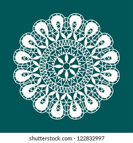 White lace. White snowflake on a blue background.